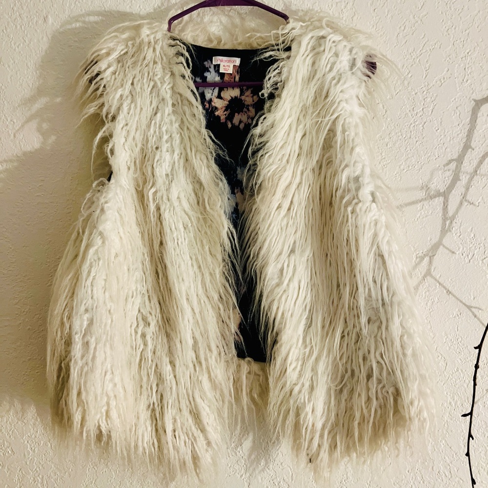 Shaggy white fur vest